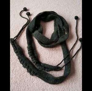 Long knit pompom scarf